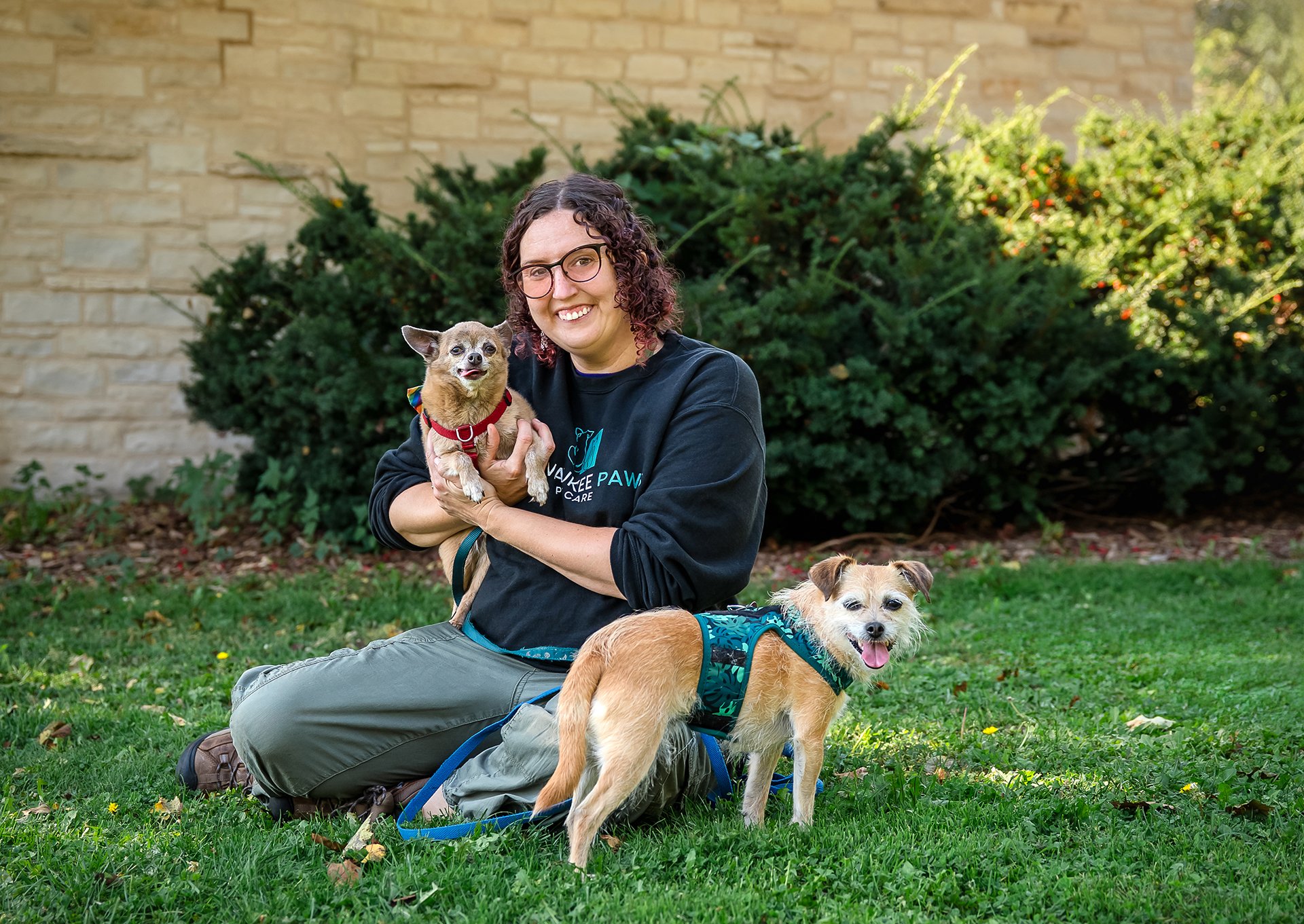 Certified, lead dog trainer with her two dogs